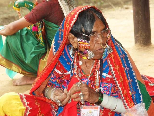 Rath Bai, an artisan from Karnataka at her stall at the Surajkund International Crafts Mela at Surajkund in Haryana. UNI