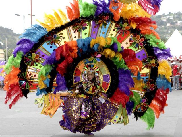 A participant takes part in a masquerade parade at the Trinidad and Tobago Red Cross Society's Children Carnival at Queen's Park Savannah, Port of Spain. REUTERS/Andrea de Silva