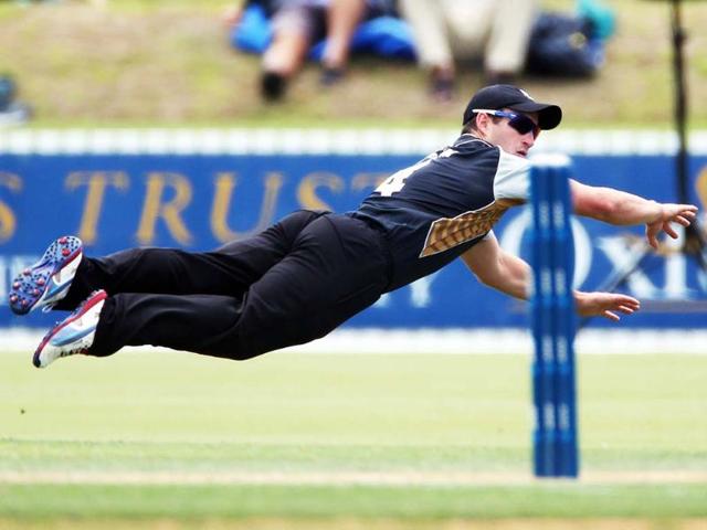 New Zealand's XI's Neil Broom dives for the ball during the warm up Twenty20 cricket match between the New Zealand XI and England at Cobham Oval in Whangarei. AFP/Michael Bradley