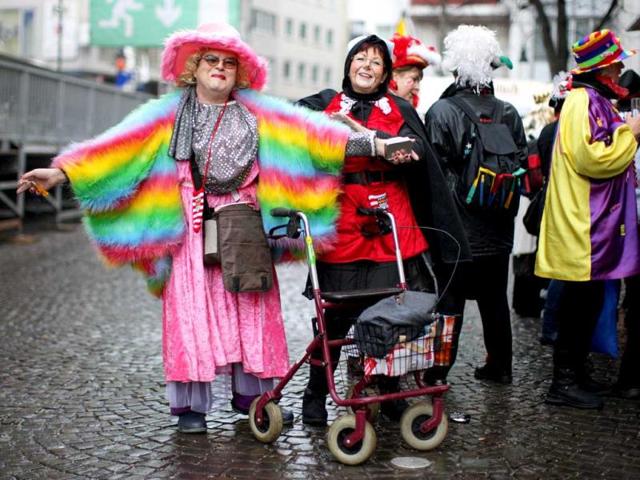 Fools celebrate the beginning of the street carnival in Cologne, western Germany as the hot carnival season was launched. AFP Photo