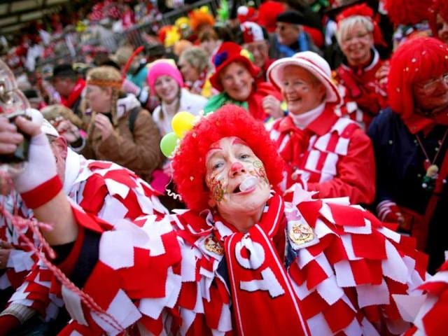 Fools celebrate the beginning of the street carnival in Cologne, western Germany as the hot carnival season was launched. AFP Photo
