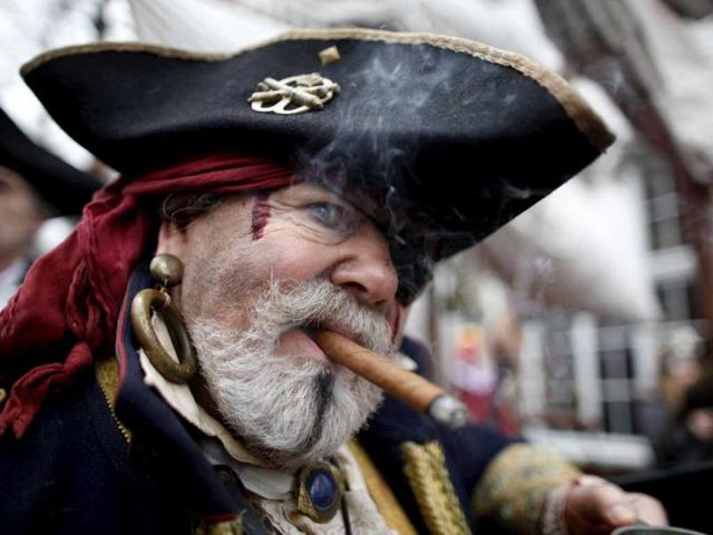 A man dressed as pirate poses during "Weiberfastnacht" (Women's Carnival) in Cologne. Reuters.