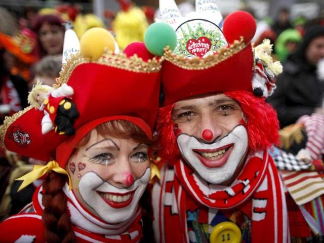 A couple in costume celebrates "Weiberfastnacht" (Women's Carnival) in Cologne. Reuters