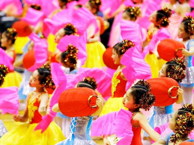 Dancers from the Jin Ling Dance School perform in celebration of the Chinese New Year before an NBA basketball between the Washington Wizards and the Brooklyn Nets in Washington. AP