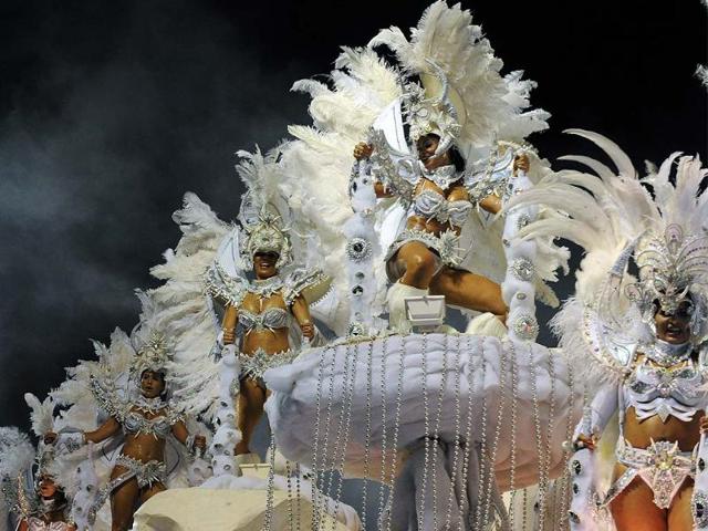 Known as the Carnival Capital of the World, this year’s edition is expected to attract a whopping 6 million revellers over 492 city blocks. From open-air street parties, gala balls, samba lessons and parades, Carnival in Rio turns the already vibrant city into a non-stop pulsing, heaving organism. The main parading days are Sunday and Monday when different samba schools compete at the Sambodromo, the “stadium” of samba, for the coveted championship. Photo: AFP / Vanderlei Almeida