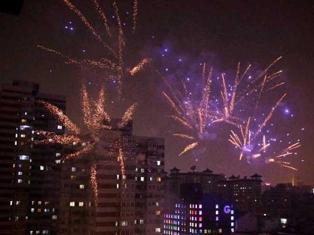 Fireworks light up the skyline of Beijing as residents celebrate the start of the Chinese New Year. (Reuters)
