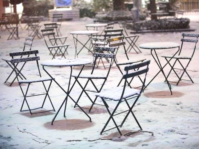 Snow covers cafe tables and chairs in New York's Bryan Park, after a blizzard pummeled the Northeastern United States. Reuters