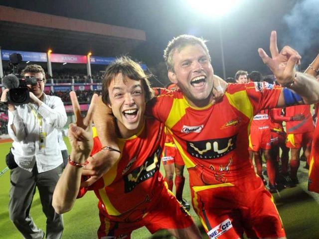 Ranchi Rhinos players celebrate after they won the final match against Delhi Waveriders during the final match of HIL at Astrotruf Stadium in Ranchi. UNI