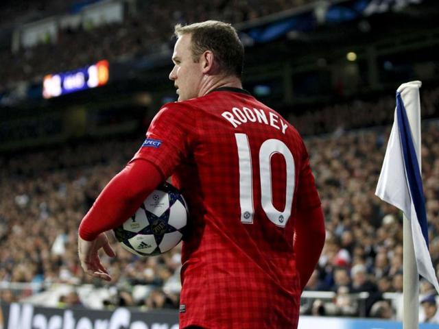 Manchester United's Wayne Rooney prepares to take a corner during the Champions League soccer match against Real Madrid at Santiago Bernabeu stadium in Madrid. Reuters