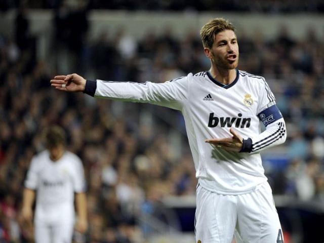 Real Madrid's defender Sergio Ramos reacts during the UEFA Champions League round of 16 first leg football match between Real Madrid and Manchester United at the Santiago Bernabeu stadium in Madrid. AFP