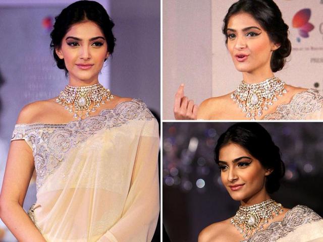 Sonam Kapoor looked radiant in a sari and the heavy ornament as she showcased diamond jewellery during an event of announcing of India's first Gem and Jewellery Fair.