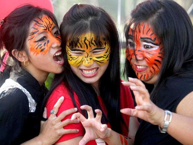 Girls take part in a global protests 'One Billion Rising' campaign to end violence against women in Kolkata. PTI Photo