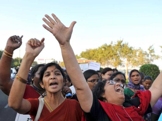 Women shout slogans during the nation wide 'One Billion Rising' global campaign in Hyderabad. AFP Photo