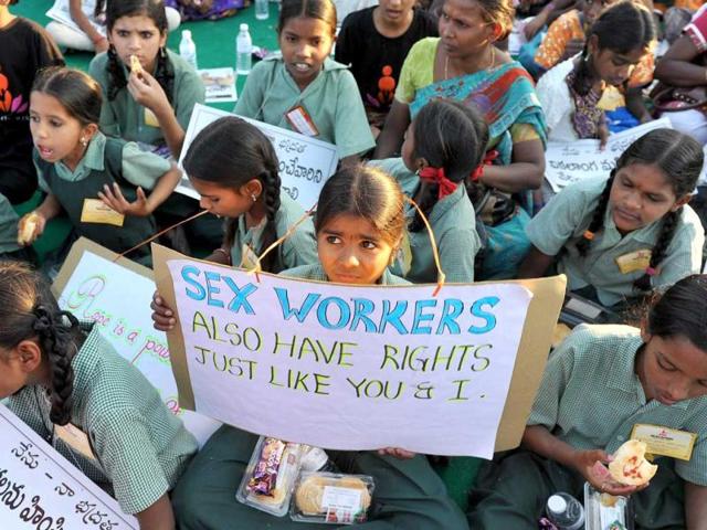 School children hold placards and shout slogans during the nation wide 'One Billion Rising' global campaign in Hyderabad. AFP Photo