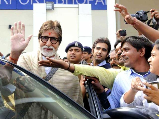 Amitabh Bachchan waves to fans as he shoots in Bhopal. The crowds went delirious as they tried to reach out to the star.
