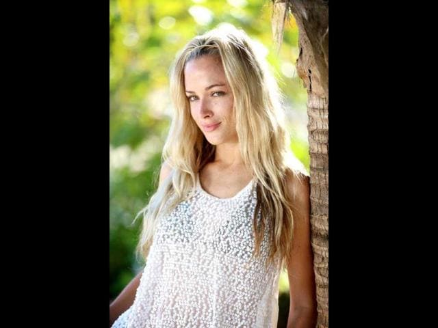 Reeva Steenkamp poses on set during the shooting of the reality show Tropika Island of Treasure which premieres on state television. (AP Photo/Courtesy of Stimulii-HO)