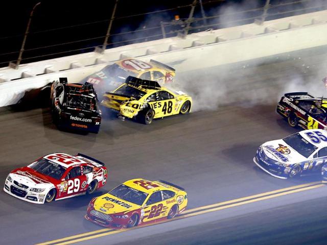 Kevin Harvick, Denny Hamlin, Jimmie Johnson, Kyle Busch, Jeff Gordon, Mark Martin, Martin Truex Jr.Kevin Harvick and Joey Logano drive away from a wreck in the NASCAR Sprint Unlimited auto race at Daytona International Speedway in Daytona Beach, Fla. AP/John Moore