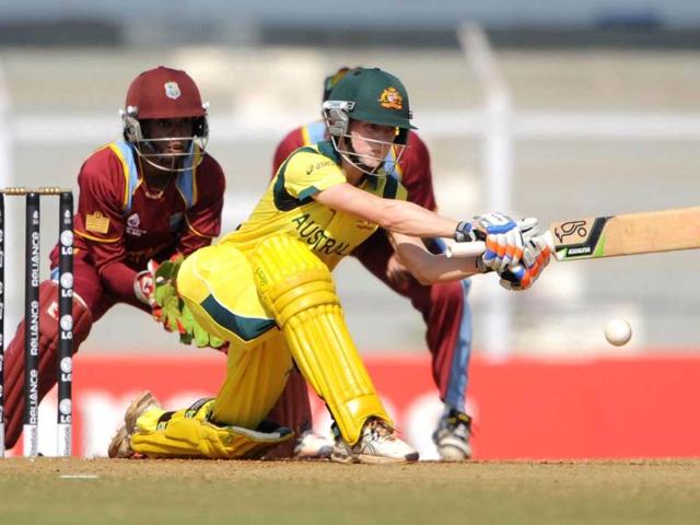 West Indian wicket-keeper Merissa Aguilleria (L) looks on as Australian cricketer Meg Lanning plays a shot during the final match of the ICC Women's World Cup 2013 between Australia and West Indies at Brabourne stadium in Mumbai. AFP Photo