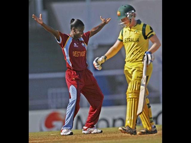 West Indies bowler Tremayne Smartt celebrates the dismisssal of Australian batswoman Alex Blackwell during the ICC Women's World Cup, final match in Mumbai. PTI Photo