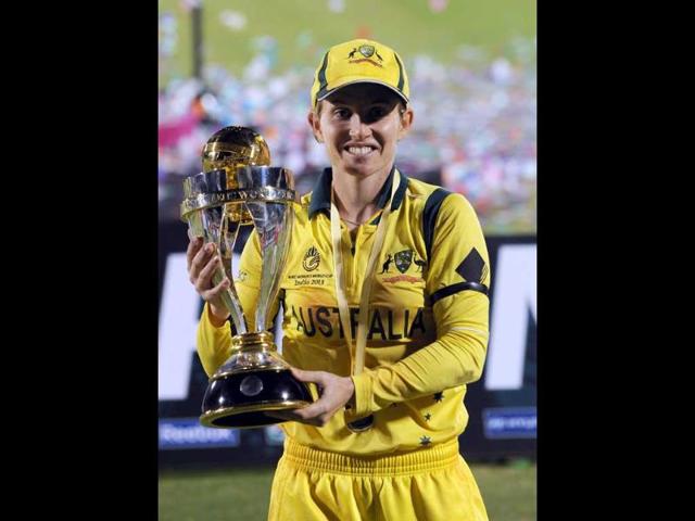 Australian cricket team captain Jodie Fields poses with their Champion's trophy after winning the ICC Women's World Cup 2013 between Australia and West Indies at the Cricket Club of Brabourne stadium in Mumbai. Australia won the match by 114 runs. AFP photo