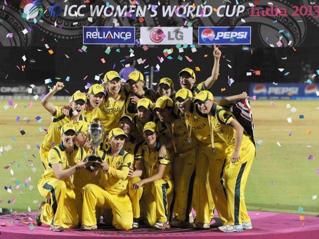 The victorious Australian cricket team poses with their Champion's trophy after winning the ICC Women's World Cup 2013 between Australia and West Indies at the Brabourne stadium in Mumbai. Australia won the match by 114 runs. AFP PHOTO