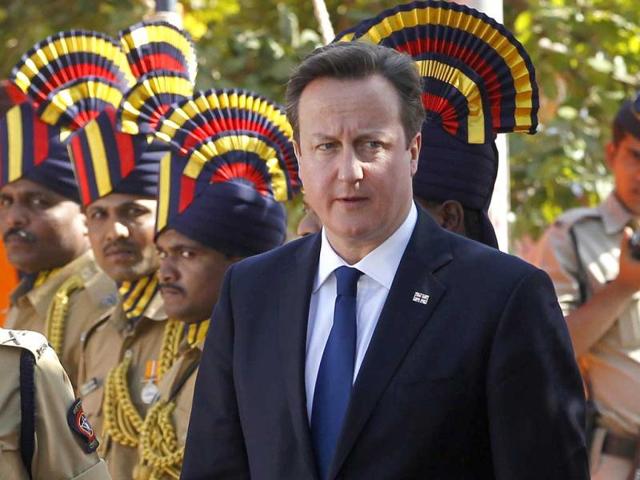British Prime Minister David Cameron arrives to pay tribute at the Police Memorial in Mumbai. AP