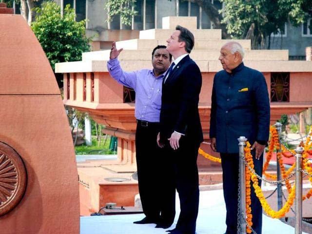 British Prime Minister David Cameron visits the site of a notorious 1919 massacre of hundreds of Indians by British forces, in Amritsar. AP photo
