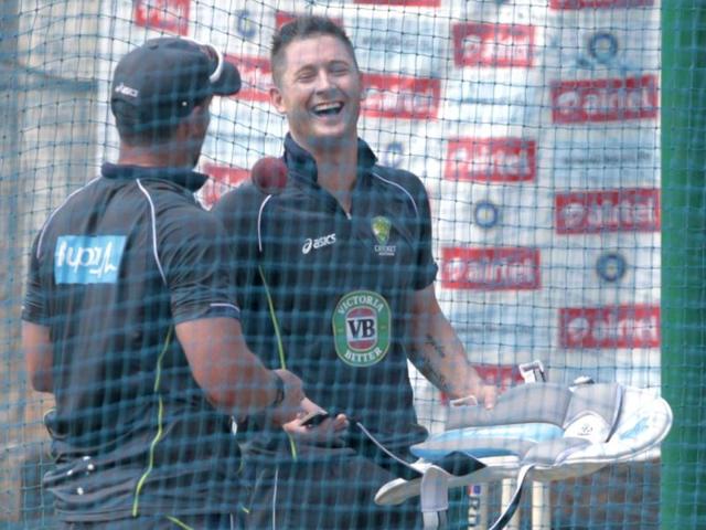 Australia captain Michael Clark talks to one of his teammates during practice session ahead of the first Test match against at Chepock stadium in Chennai. HT photo/Santosh Harhare