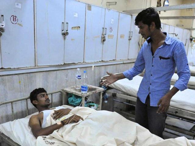 A bomb blast victim is being seen at Osmania Hospital in Hyderabad after twin bombings killed at least 14 people in the city. AFP