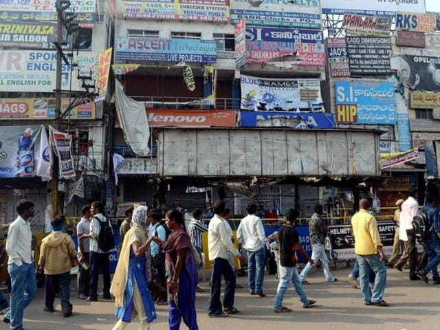Damaged shops are seen at the site of the bomb blast in Hyderabad. The image of the suspect on bicycle could prove a vital clue in the investigations. AFP/Indranil Mukherjee