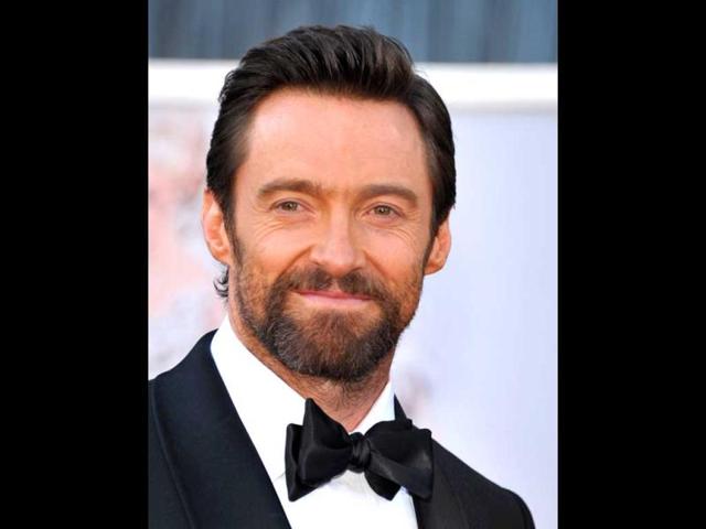 Actor Hugh Jackman arrives at the Oscars at the Dolby Theatre on Sunday Feb. 24, 2013, in Los Angeles. AP Photo