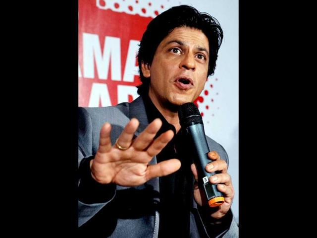 Shah Rukh Khan speaks during a press conference on the occasion of the opening of Toyota University Cricket Championship (TUCC) on February 23, 2013. (AFP PHOTO)
