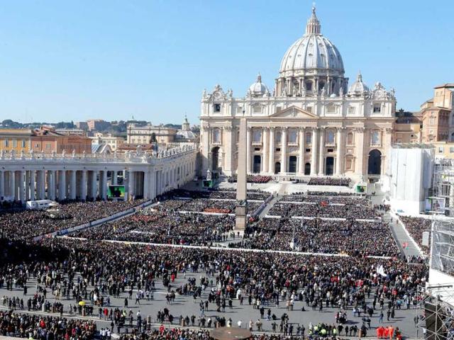 People crowd St Peter's Square where Pope Benedict XVI gave his last general audience, at the Vatican. Starting next week, cardinals from around the world will begin a series of meetings to consider possible candidates for pope. AP/Dmitry Lovetsky
