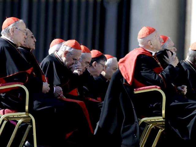 Cardinals attend pope's general audience in St Peter's Square at the Vatican. A total of 115 "cardinal electors" are scheduled to take part in the conclave to decide the next head of the Catholic Church. AP/Gregorio Borgia
