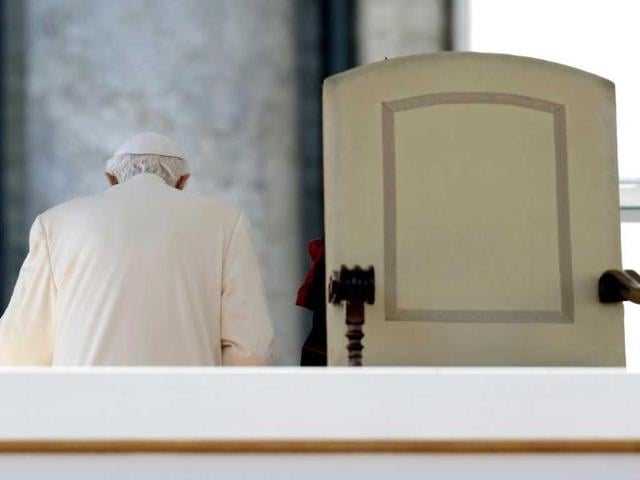 Pope Benedict XVI leaves after celebrating his last general audience. Benedict will be whisked off by helicopter to the papal summer residence of Castel Gandolfo near Rome after he steps down. AP/Gregorio Borgia