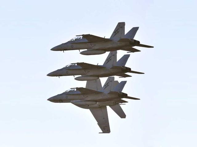 Royal Australian Air Force FA-18 Super Hornets complete a flying demonstration at the first public day at the Australian International Airshow in Melbourne. (AFP Photo)