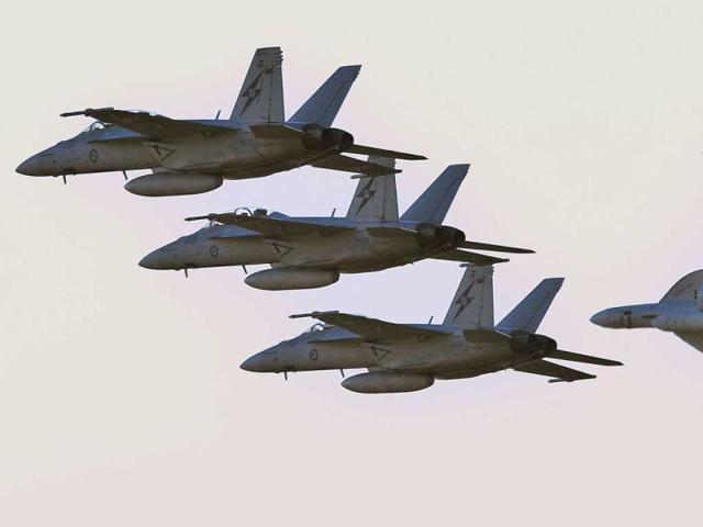 Royal Australian Air Force FA-18 Super Hornets complete a flying demonstration at the first public day at the Australian International Airshow in Melbourne. (AFP Photo)