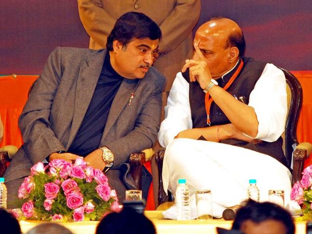 BJP president Rajnath Singh interacts with his predecessor Nitin Gadkari at the BJP National Executive Meeting in New Delhi. (UNI)