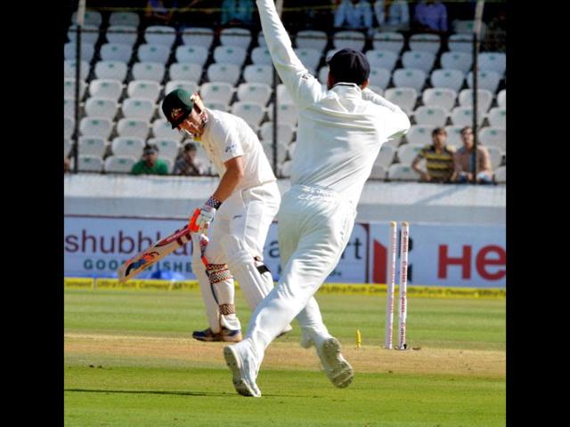 Australia's DA Warner is bowled out by India's B Kumar during the 2nd cricket Test match in Hyderabad. (PTI Photo)
