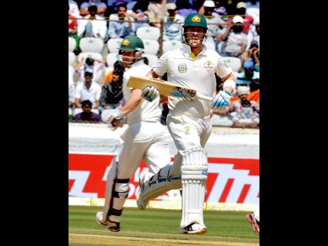 Australia's Michael Clarke takes a run with M Wade during the first day of the 2nd cricket Test match against India in Hyderabad. (PTI Photo)