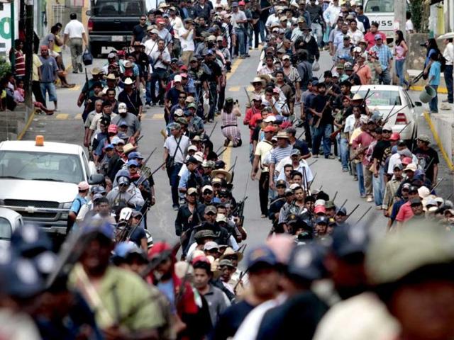 Armed residents take part in the March for Justice and Dignity, in Ayutla de los Libres, in the southwestern State of Guerrero, Mexico. (AFP Photo)