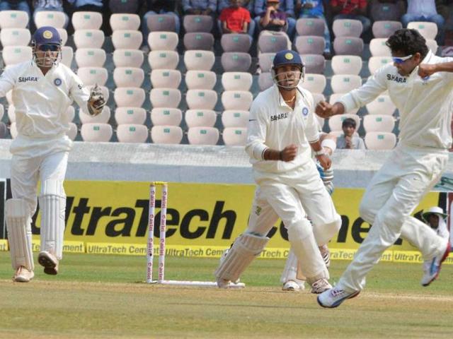 Indian players celebrate the dismissal of Australian skipper MJ Clarke on the fourth day of the second Test match between India and Australia in Hyderabad. PTI