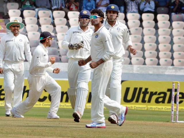 Indian team celebrates the dismissal of MJ Clarke on fourth day of the second Test match against Australia in Hyderabad. PTI