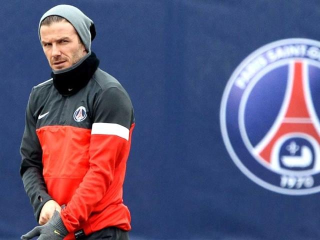 Paris-Saint-Germain-s-English-midfielder-David-Beckham-arrives-for-a-training-session-on-March-5-2013-at-the-Parc-des-Princes-stadium-in-Paris-on-the-eve-of-an-UEFA-Champions-League-round-of-16-second-leg-football-match-against-Valencia--AFP-PHOTO