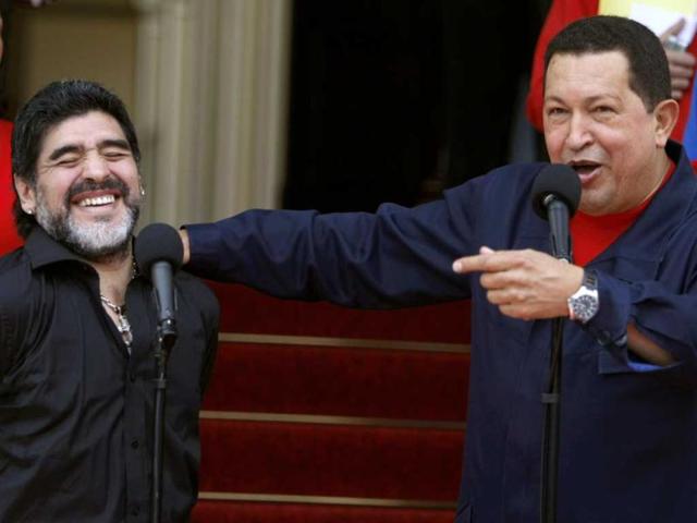 Venezuela's President Hugo Chavez speaks next to Argentina's national soccer team coach Diego Armando Maradona in Caracas, Venezuela. (AP)