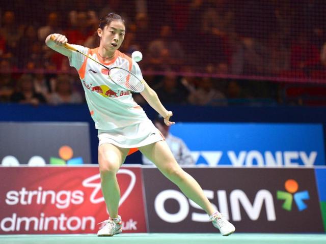 China's Wang Shixian returns to Saina Nehwal during their All England Open Badminton Championships women's singles quarter-final match in Birmingham, central England. AFP/Ben Stansall