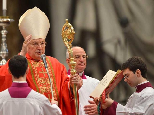 Dean of the College of Cardinals Angelo Sodano leads a mass at the St Peter's basilica at the Vatican. Once a cardinal has been elected pope, the master of liturgical ceremonies enters the Sistine Chapel and the senior cardinal asks "Do you accept your canonical election as Supreme Pontiff?" Assuming the cardinal says "I accept," the senior cardinal then asks: "By what name do you wish to be called?" The master of liturgical ceremonies, Monsignor Guido Marini, then enters the information on a formal document. AFP/Gabriel Bouys