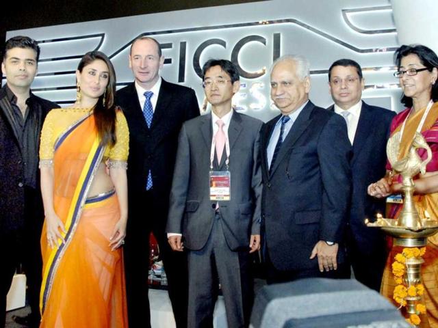 Union Minister of State for External Affairs Preneet Kaur at inauguration of FICCI Frames 2013. Actor Kareena Kapoor and dirctor Karan Johar were also present in Mumbai on Tuesday. (UNI Photo)