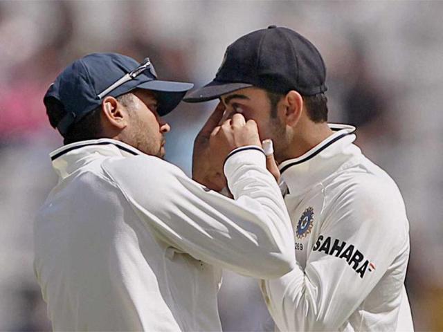 Virat Kohli and M Vijay during the final day of the 3rd Test match against Australia in Mohali. (PTI Photo)
