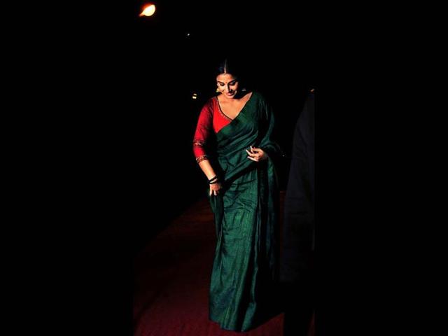 Vidya Balan walks on a red carpet at Bawraas, a live performance event on March 15, 2013. (AFP Photo)